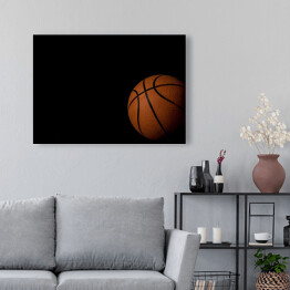 Obraz na płótnie Piłka do koszykówki na czarnym tle