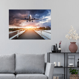 Plakat samoprzylepny Samolot i drewniany most o zachodzie słońca