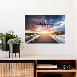 Plakat samoprzylepny Samolot i drewniany most o zachodzie słońca