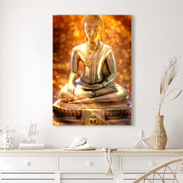 Obraz na płótnie Budda - statua na złotym tle
