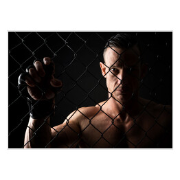 Plakat samoprzylepny Zawodnik MMA w półmroku