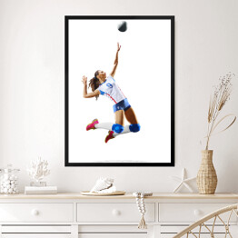 Obraz w ramie Kobieta grająca w siatkówkę na białym tle