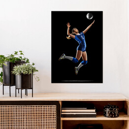 Plakat samoprzylepny Kobieta grająca w siatkówkę na czarnym tle
