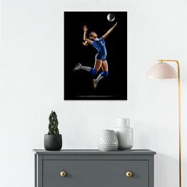 Plakat samoprzylepny Kobieta grająca w siatkówkę na czarnym tle
