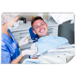 Fototapeta Zadowolony pacjent u dentysty