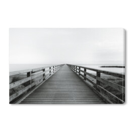 Obraz na płótnie Drewniany most na morzu, monochrom