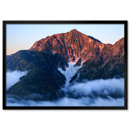 Plakat w ramie Alpy Północne zabarwione na czerwono podczas wschodu słońca