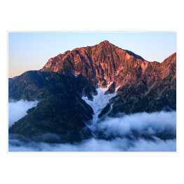 Plakat samoprzylepny Alpy Północne zabarwione na czerwono podczas wschodu słońca