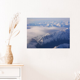 Plakat samoprzylepny Góry zasypane śniegiem widziane z samolotu