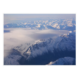 Plakat Góry zasypane śniegiem widziane z samolotu