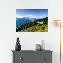 Plakat samoprzylepny Drewniana chata na alpejskim wzgórzu