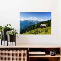 Plakat samoprzylepny Drewniana chata na alpejskim wzgórzu