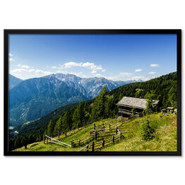 Plakat w ramie Drewniana chata na alpejskim wzgórzu
