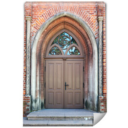 Fototapeta Centralne drzwi wejściowe do starego średniowiecznego kościoła z cegły