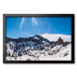 Obraz w ramie Skaliste góry pokryte śniegiem