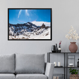 Obraz w ramie Skaliste góry pokryte śniegiem