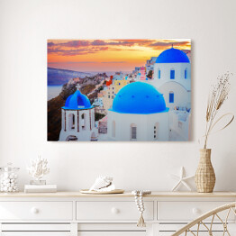 Obraz na płótnie Tradycyjne greckie miasteczko Oia na wyspie Santorini z niebieskimi kopułami kościołów