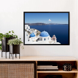 Obraz w ramie Widok na białe domy i niebieskie dachy na Santorini