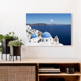 Obraz na płótnie Widok na białe domy i niebieskie dachy na Santorini