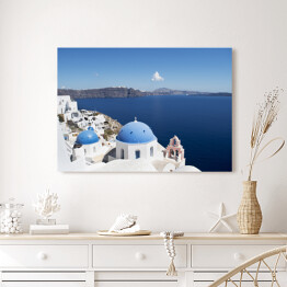Obraz na płótnie Widok na białe domy i niebieskie dachy na Santorini