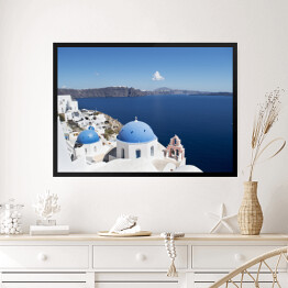 Obraz w ramie Widok na białe domy i niebieskie dachy na Santorini