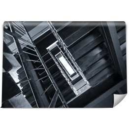Fototapeta winylowa zmywalna Ciemne schody w wysokim budynku
