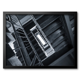 Obraz w ramie Ciemne schody w wysokim budynku
