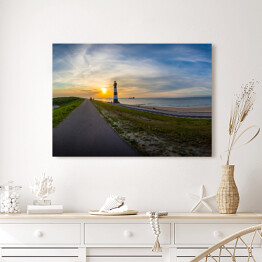 Obraz na płótnie Długa droga w stronę słońca i latarnia morska, Breskens - Holandia