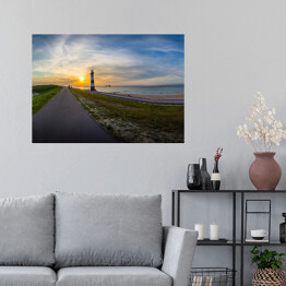 Plakat samoprzylepny Długa droga w stronę słońca i latarnia morska, Breskens - Holandia