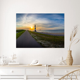 Plakat samoprzylepny Długa droga w stronę słońca i latarnia morska, Breskens - Holandia