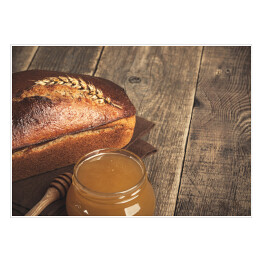 Plakat Domowej roboty żytni chleb i szklany słój z miodem