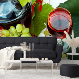 Kieliszek wina i winogrona na stole