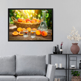 Obraz w ramie Owocowa brandy w kieliszku oraz świeże morele