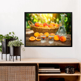 Obraz w ramie Owocowa brandy w kieliszku oraz świeże morele