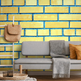 Fototapeta Ściana z żółtymi cegłami