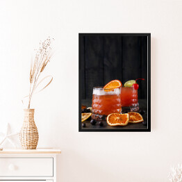 Obraz w ramie Pomarańczowy koktajl na drewnianym tłe