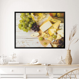 Obraz w ramie Płyta serowa z winem, świeżymi winogronami i gruszkami