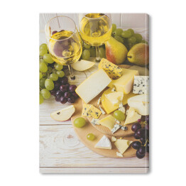 Obraz na płótnie Płyta serowa z winem, świeżymi winogronami i gruszkami