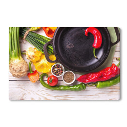 Obraz na płótnie Różnorodne warzywne składniki na drewnianym stole 