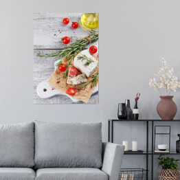 Plakat Świeży ser feta z rozmarynem na białej drewnianej desce