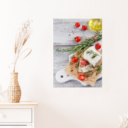 Plakat Świeży ser feta z rozmarynem na białej drewnianej desce