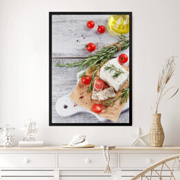 Obraz w ramie Świeży ser feta z rozmarynem na białej drewnianej desce