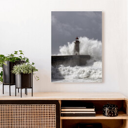 Obraz na płótnie Burzowa fala i latarnia morska