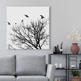 Obraz na płótnie Czarne ptaki latające nad koroną drzwa