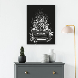 Obraz na płótnie Biała maszyna do pisania z literami na czarnym tle