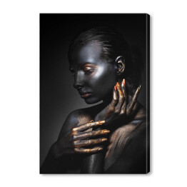 Obraz na płótnie Kobieta w afrykańskim czarno złotym makijażu