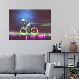 Plakat Rowerzysta jadący nocą na neonowym rowerze