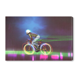 Obraz na płótnie Rowerzysta jadący nocą na neonowym rowerze