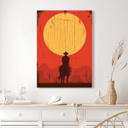 Obraz na płótnie Cowboy jadący na koniu w stronę słońca