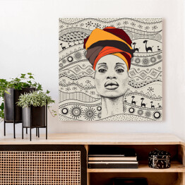 Obraz na płótnie Kobieta z Afryki w barwnym turbanie na tle afrykańskich motywów